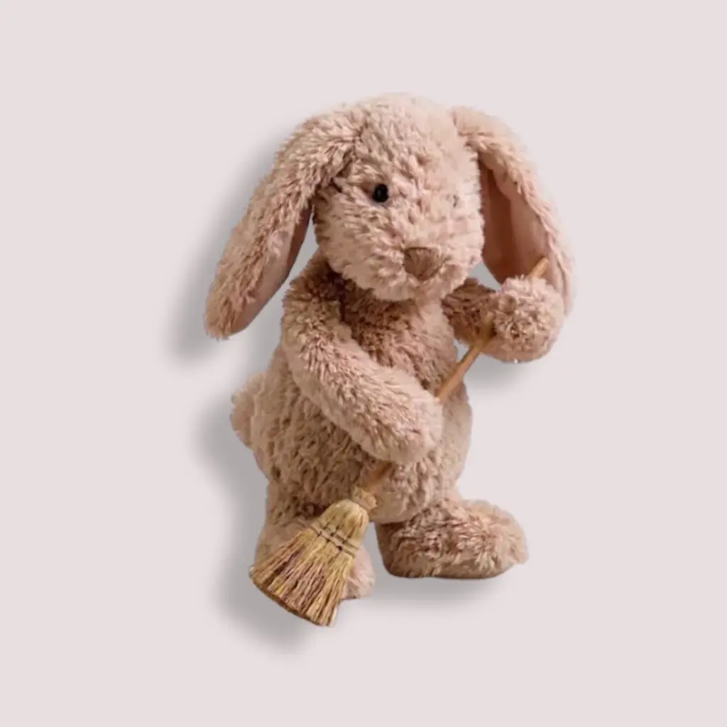 Pluchen konijn met een bezempje
